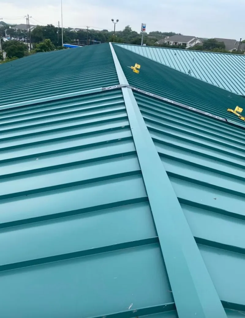 Green commercial metal roof ridge and valley for Metal Roof Repair in Yakima
